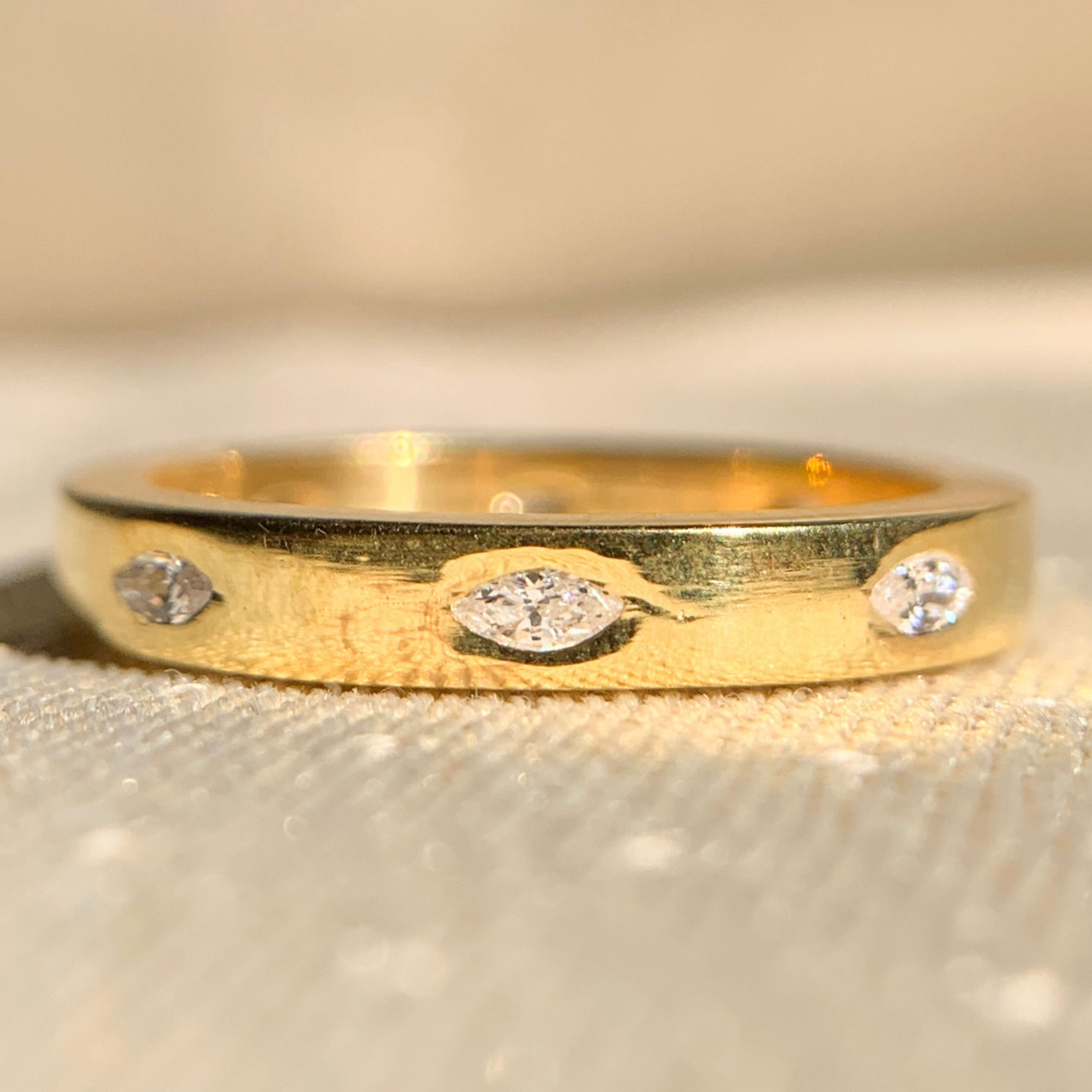 Elegant marquise cut diamond stacking ring in yellow gold